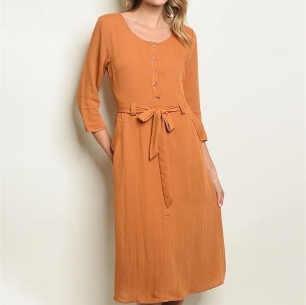 Boutique dress with button detail
